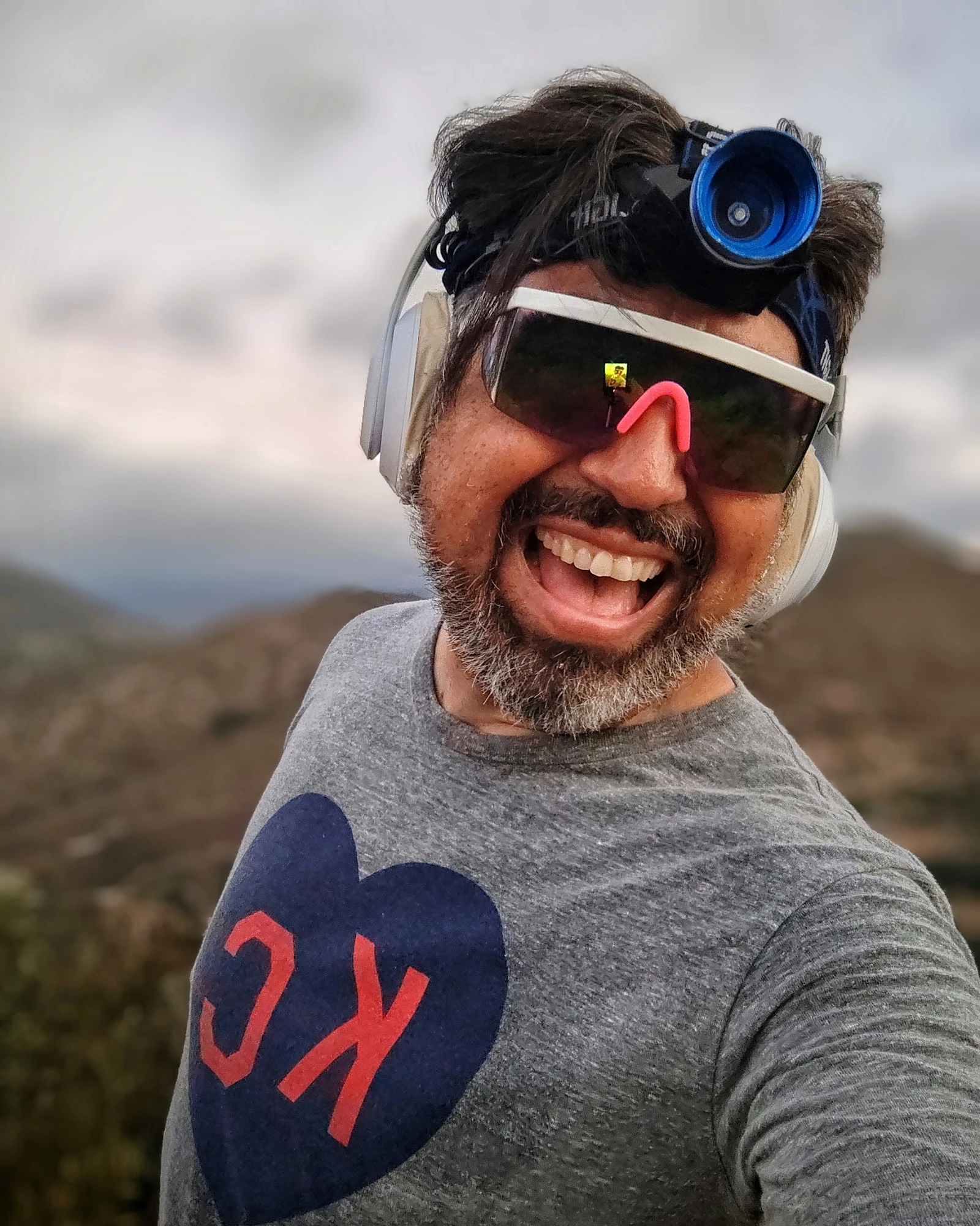 A playful close-up outdoors in trail gear